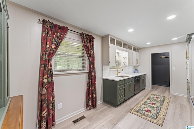 8892 Moody Pkwy, Odenville, AL 35120 - kitchen with light countertops, light wood-style flooring, dishwasher, and recessed lighting