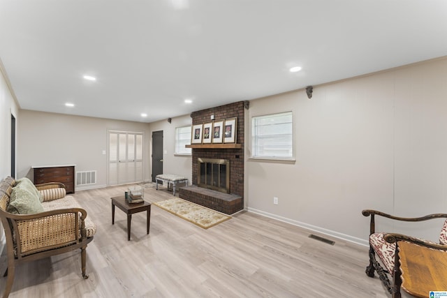8892 Moody Pkwy, Odenville, AL 35120 - living room with a fireplace, light wood-type flooring, and recessed lighting