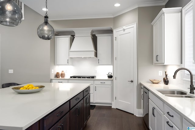 3041 Adley Cir, Hoover, AL 35244 - kitchen featuring premium range hood, dark wood-type flooring, light countertops, recessed lighting, and white cabinetry