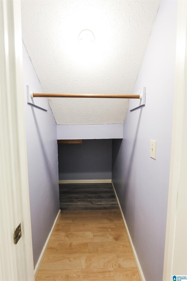 1534 Cambridge Pl, Anniston, AL 36207 - stairway with a textured ceiling and wood finished floors