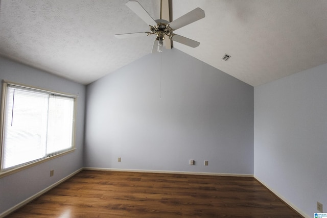 1534 Cambridge Pl, Anniston, AL 36207 - empty room with lofted ceiling, wood finished floors, and ceiling fan