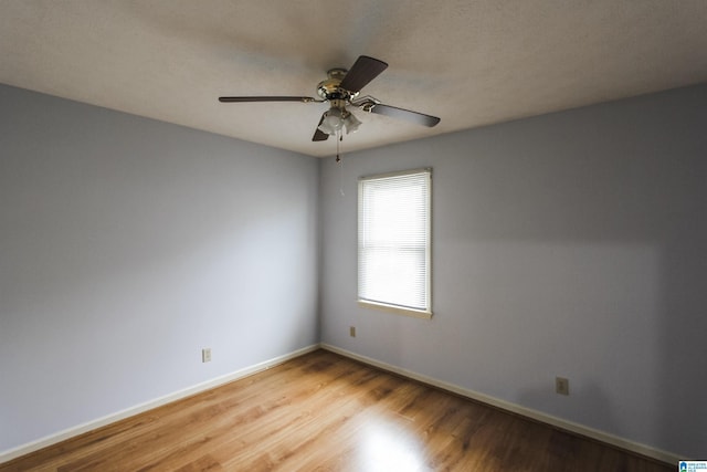 1534 Cambridge Pl, Anniston, AL 36207 - unfurnished room featuring wood finished floors and a ceiling fan