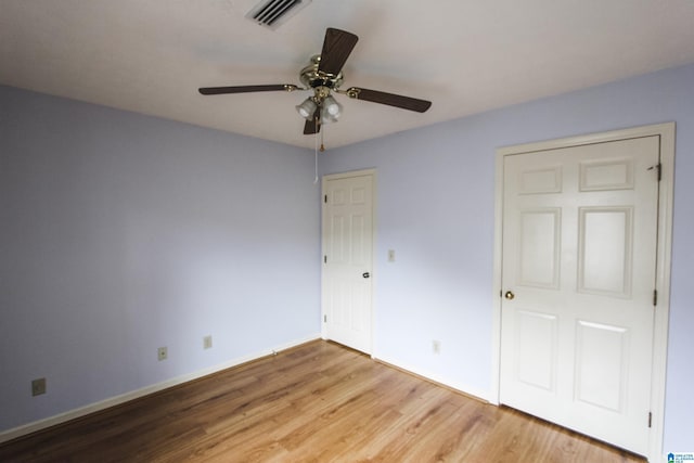 1534 Cambridge Pl, Anniston, AL 36207 - unfurnished bedroom featuring wood finished floors and ceiling fan