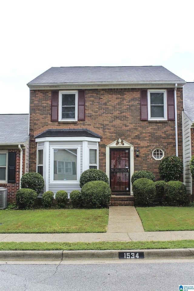 1534 Cambridge Pl, Anniston, AL 36207 - view of front of house with a front lawn and brick siding