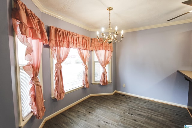 1534 Cambridge Pl, Anniston, AL 36207 - unfurnished dining area with crown molding, a chandelier, wood finished floors, and a ceiling fan