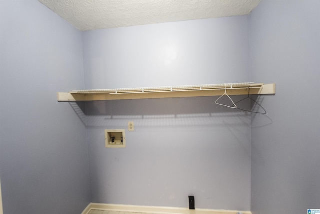 1534 Cambridge Pl, Anniston, AL 36207 - washroom with washer hookup and baseboards