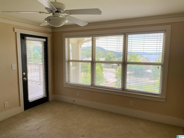 475 River Forest Ln Unit 2440, Talladega, AL 35160 - empty room featuring healthy amount of natural light, carpet flooring, and a ceiling fan