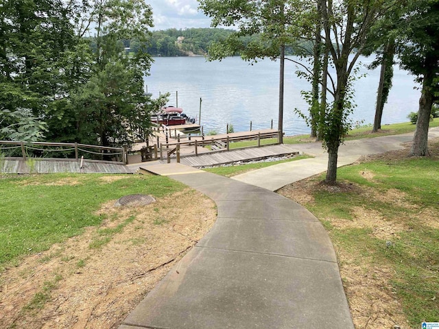 475 River Forest Ln Unit 2440, Talladega, AL 35160 - surrounding community with a water view, a boat dock, and a yard