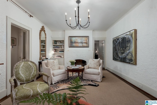 117 Elm St, Mountain Brook, AL 35213 - sitting room featuring ornamental molding, a chandelier, a fireplace, built in shelves, and carpet