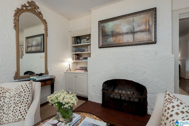 117 Elm St, Mountain Brook, AL 35213 - living area featuring ornamental molding, a fireplace, and built in features