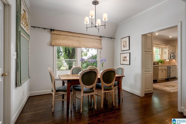 117 Elm St, Mountain Brook, AL 35213 - dining space with ornamental molding, lofted ceiling, a chandelier, healthy amount of natural light, and dark wood-type flooring