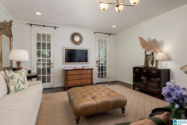 117 Elm St, Mountain Brook, AL 35213 - living area with a chandelier, plenty of natural light, wood finished floors, crown molding, and recessed lighting