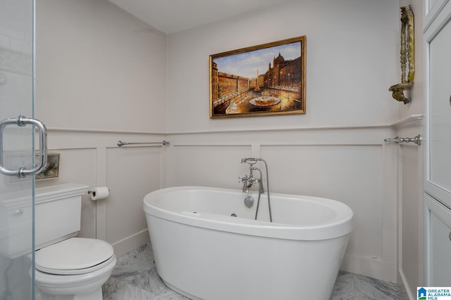 117 Elm St, Mountain Brook, AL 35213 - full bath with marble look tile flooring, a decorative wall, a freestanding bath, wainscoting, and an enclosed shower