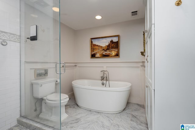 117 Elm St, Mountain Brook, AL 35213 - bathroom with marble finish flooring, a freestanding bath, a shower stall, and recessed lighting