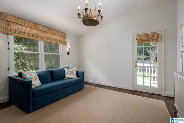 117 Elm St, Mountain Brook, AL 35213 - living room featuring a chandelier, lofted ceiling, and wood finished floors