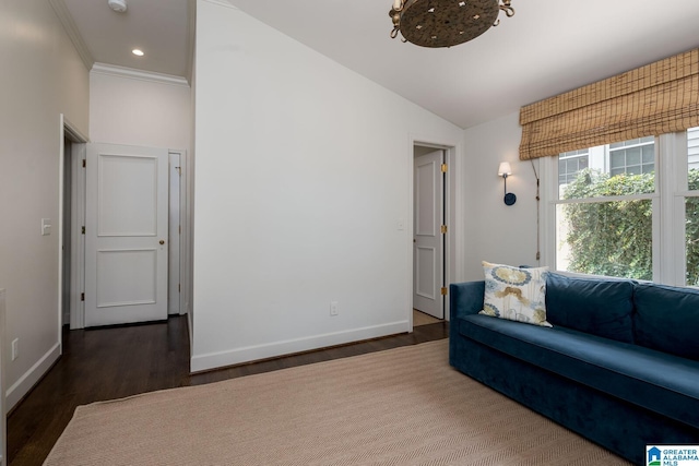 117 Elm St, Mountain Brook, AL 35213 - living area with wood finished floors, vaulted ceiling, ornamental molding, and recessed lighting