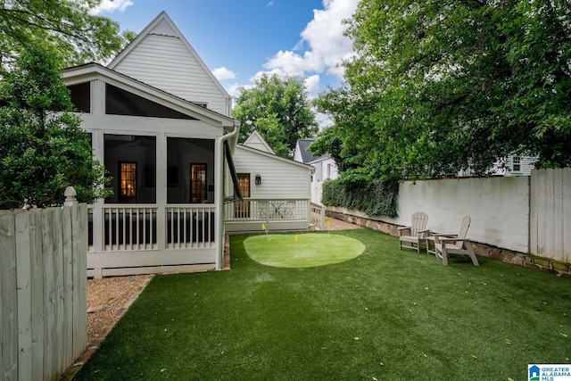 117 Elm St, Mountain Brook, AL 35213 - view of yard featuring a sunroom and a putting green