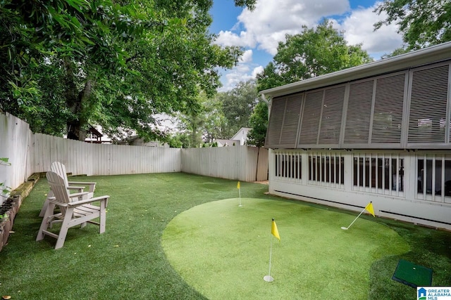 117 Elm St, Mountain Brook, AL 35213 - fenced backyard featuring an area to practice putting
