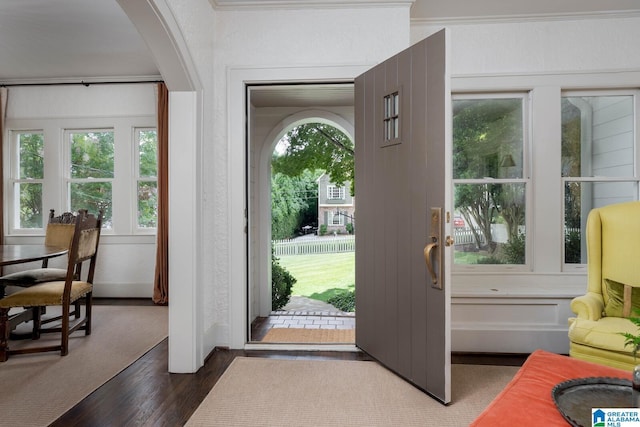 117 Elm St, Mountain Brook, AL 35213 - foyer entrance featuring arched walkways and dark wood-style floors