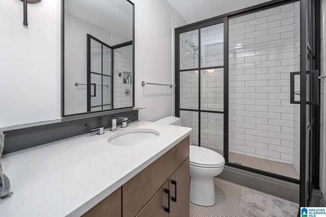 2212 Morris Ave Unit 323, Birmingham, AL 35203 - full bath with a stall shower, vanity, and tile patterned flooring