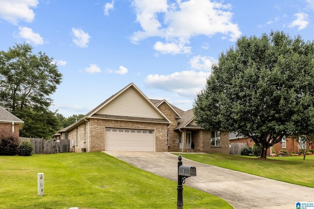 2043 Maplewood Ln, Clanton, AL 35045 - view of front of property with driveway, brick siding, and an attached garage
