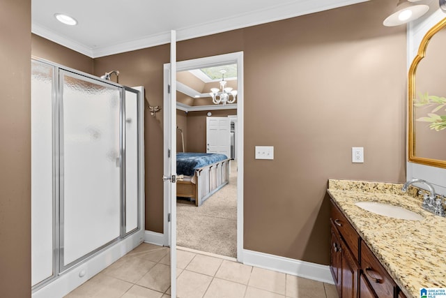 2043 Maplewood Ln, Clanton, AL 35045 - full bath with a shower stall, vanity, crown molding, connected bathroom, and tile patterned floors