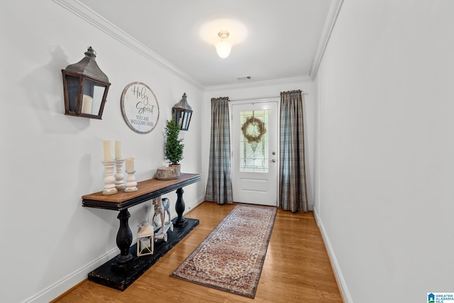 2043 Maplewood Ln, Clanton, AL 35045 - entryway with crown molding and wood finished floors
