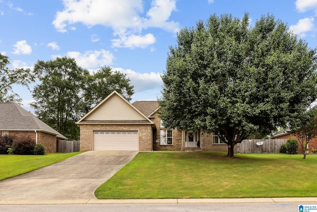 2043 Maplewood Ln, Clanton, AL 35045 - view of front of property with brick siding, driveway, and a garage