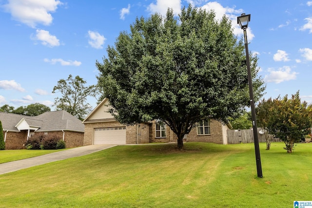 2043 Maplewood Ln, Clanton, AL 35045 - view of front of house with brick siding, a garage, and driveway