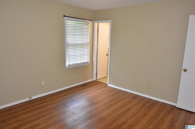 6301 Cedar Ct, Anniston, AL 36206 - unfurnished room with wood finished floors and plenty of natural light