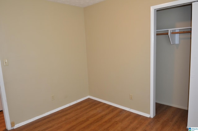 6301 Cedar Ct, Anniston, AL 36206 - unfurnished bedroom featuring wood finished floors and a closet