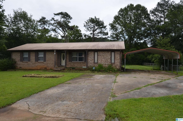 6301 Cedar Ct, Anniston, AL 36206 - view of front of home featuring driveway, a carport, a front yard, crawl space, and brick siding