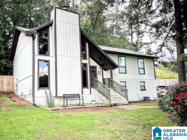 1025 Old Section Rd, Hoover, AL 35244 - back of property with a chimney