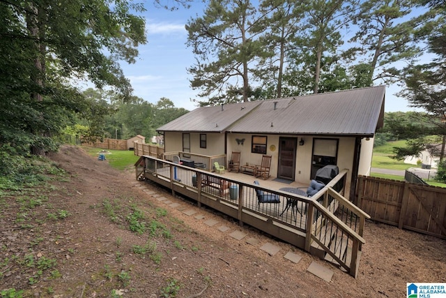 1025 Old Section Rd, Hoover, AL 35244 - rear view of house featuring a metal roof and a deck