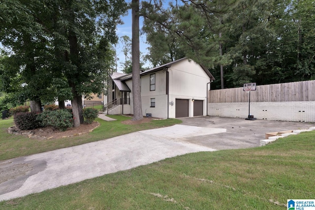 1025 Old Section Rd, Hoover, AL 35244 - view of side of property featuring a garage and concrete driveway