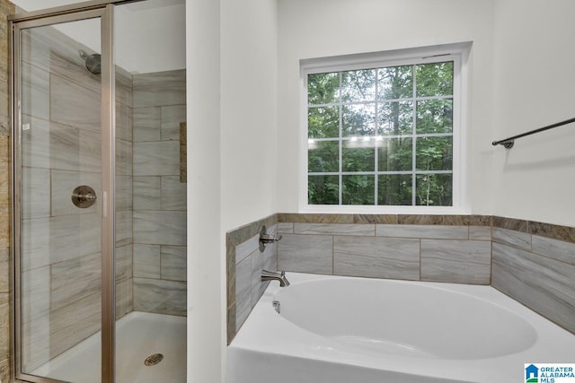 7945 Forest Loop, Pinson, AL 35126 - bathroom with a stall shower and a bath