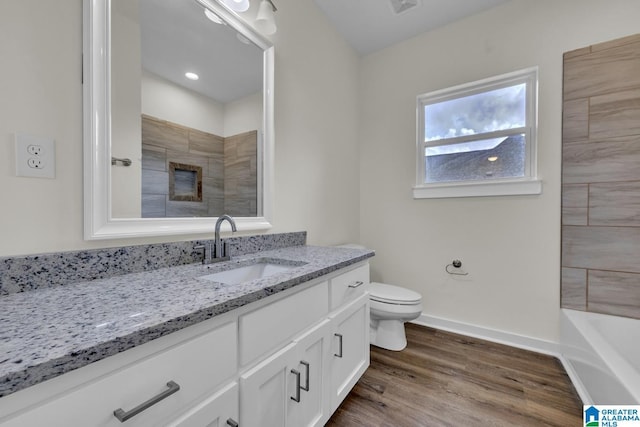 7945 Forest Loop, Pinson, AL 35126 - full bathroom featuring vanity and wood finished floors