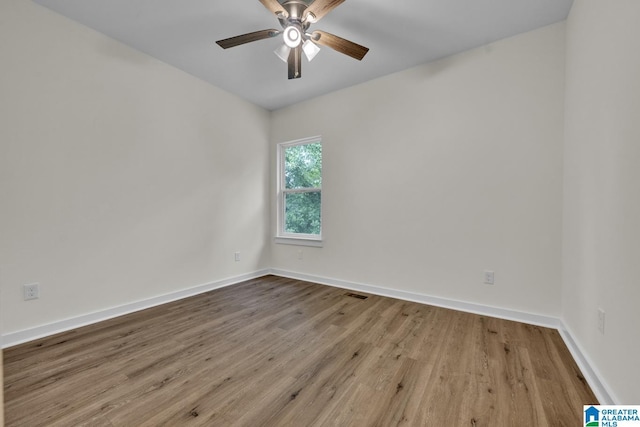 7945 Forest Loop, Pinson, AL 35126 - spare room featuring wood finished floors and ceiling fan