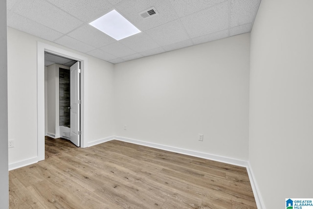 7945 Forest Loop, Pinson, AL 35126 - spare room with wood finished floors and a paneled ceiling