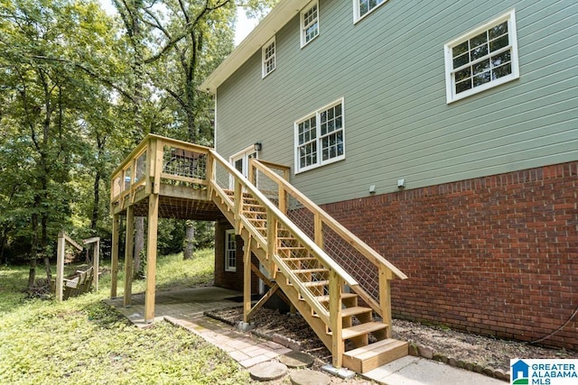 1004 Broken Bow Trl, Alabaster, AL 35007 - back of house with a deck, stairway, a patio area, and brick siding
