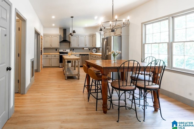1004 Broken Bow Trl, Alabaster, AL 35007 - dining area with a chandelier, light wood-style floors, and recessed lighting