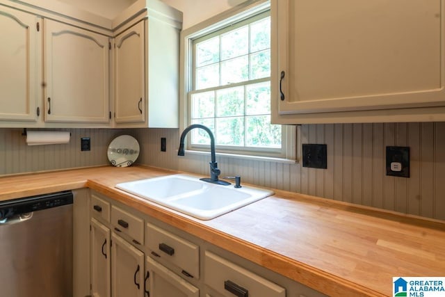 1004 Broken Bow Trl, Alabaster, AL 35007 - kitchen with dishwasher, butcher block countertops, and white cabinets