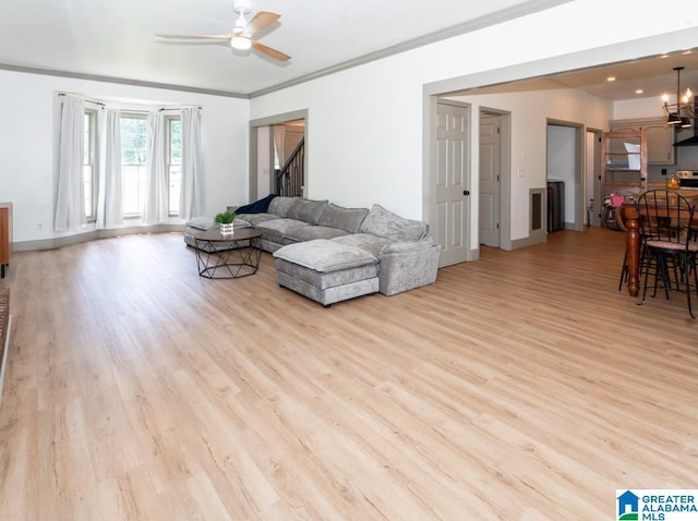 1004 Broken Bow Trl, Alabaster, AL 35007 - living room featuring ceiling fan, light wood-style floors, stairway, and ornamental molding