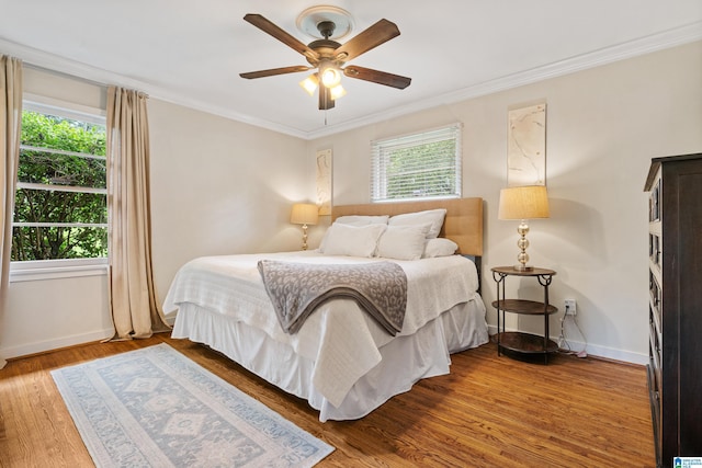 4317 Warren Rd, Birmingham, AL 35213 - bedroom featuring multiple windows, ornamental molding, wood finished floors, and ceiling fan