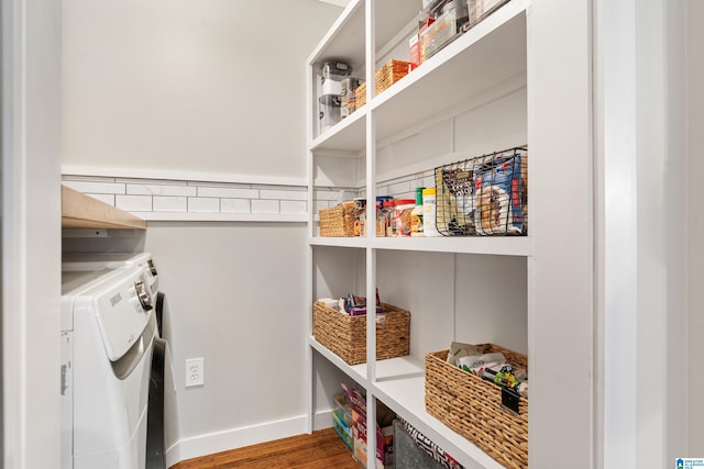 4317 Warren Rd, Birmingham, AL 35213 - washroom with washer and clothes dryer and wood finished floors