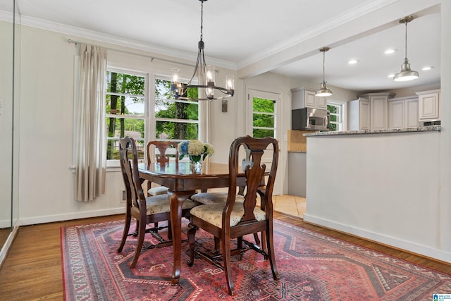 4317 Warren Rd, Birmingham, AL 35213 - dining room featuring a chandelier, crown molding, recessed lighting, and wood finished floors