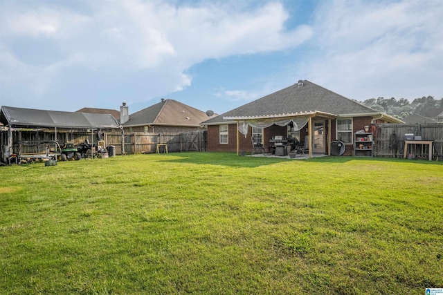 955 Clover Ave, Odenville, AL 35120 - fenced backyard with a patio