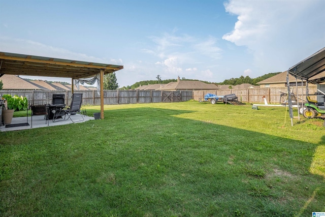 955 Clover Ave, Odenville, AL 35120 - fenced backyard with a patio area