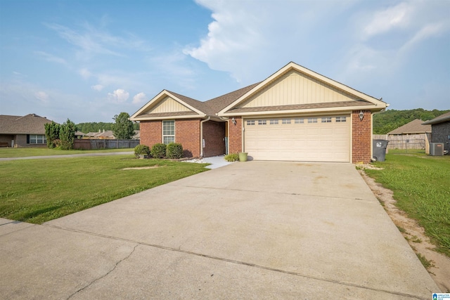 955 Clover Ave, Odenville, AL 35120 - view of front of house with brick siding, driveway, and an attached garage