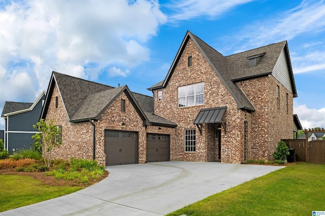 1313 Severn Way, Hoover, AL 35244 - view of front of home with brick siding, an attached garage, roof with shingles, and driveway